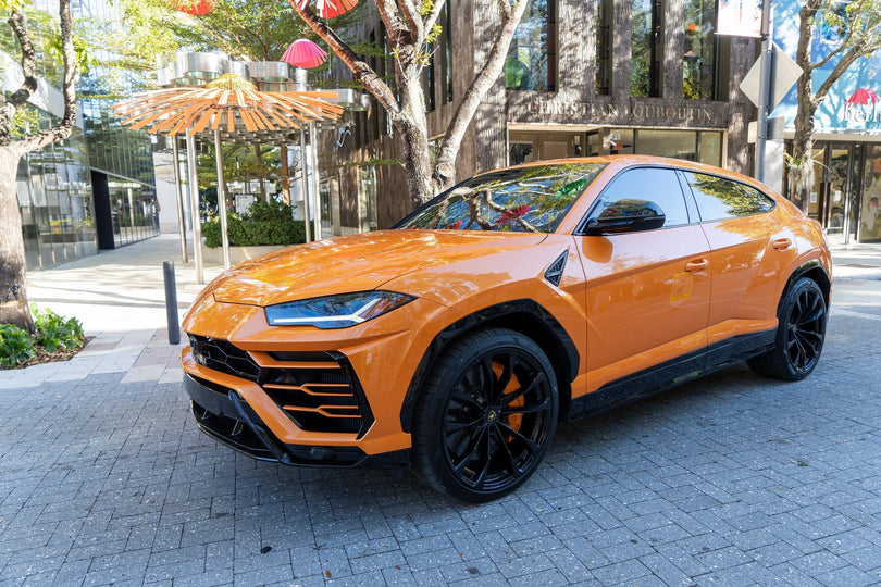 Orange 2022 Lamborghini Urus for Rent in Miami